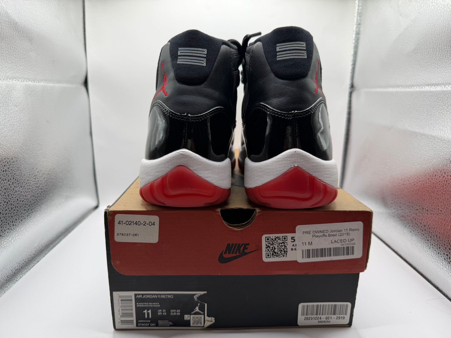 PRE OWNED Jordan 11 Retro Playoffs Bred (2019)